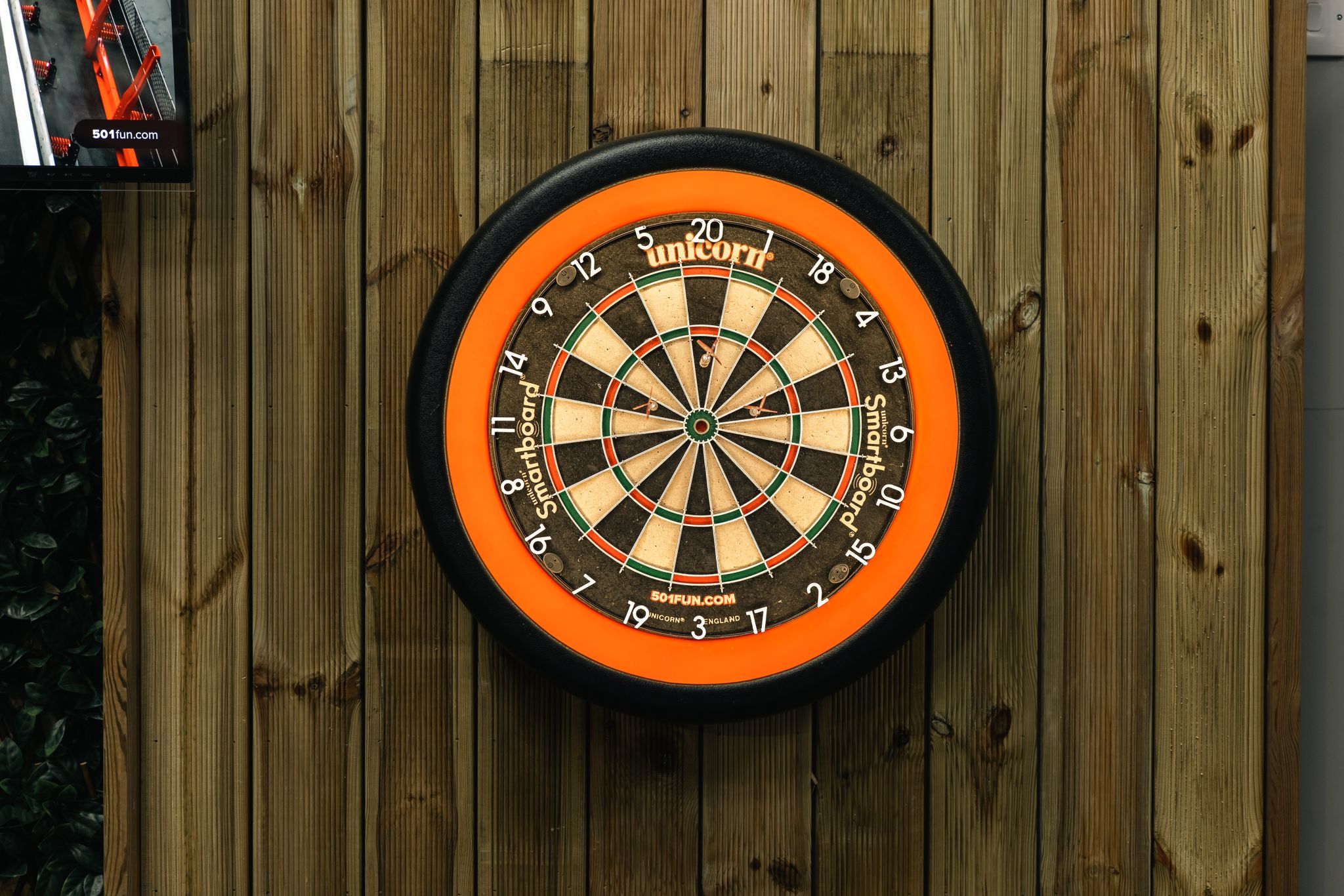 Interactive dartboard at Trapeze Bar